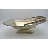 A large George IV silver swivel handle basket by William Eaton, London 1821, of rectangular form