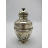 A George V silver tea caddy by Elkington, Birmingham 1910, designed in a lidded urn shape with