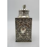 A Victorian silver tea caddy by William Comyns & Sons, London 1897, of rectangular form with