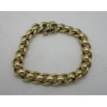 A 9ct gold ladies bracelet with curb links and hoops, 45 g