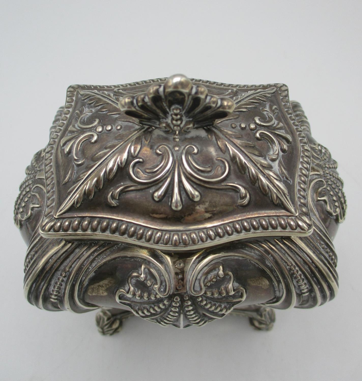 A Victorian silver tea caddy by Thomas Bradbury & Sons, London 1894, of bombe form with repousse - Image 2 of 7