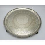 A Victorian silver circular salver by Walter and John Barnard, London 1878, designed with etched