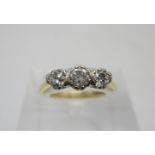 An 18ct gold ring set with three diamonds, approx 0.5ct combined, 3.1g, size M/N