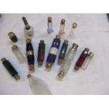 A quantity of Victorian and later scent bottles to include double ended and silver topped bottles,