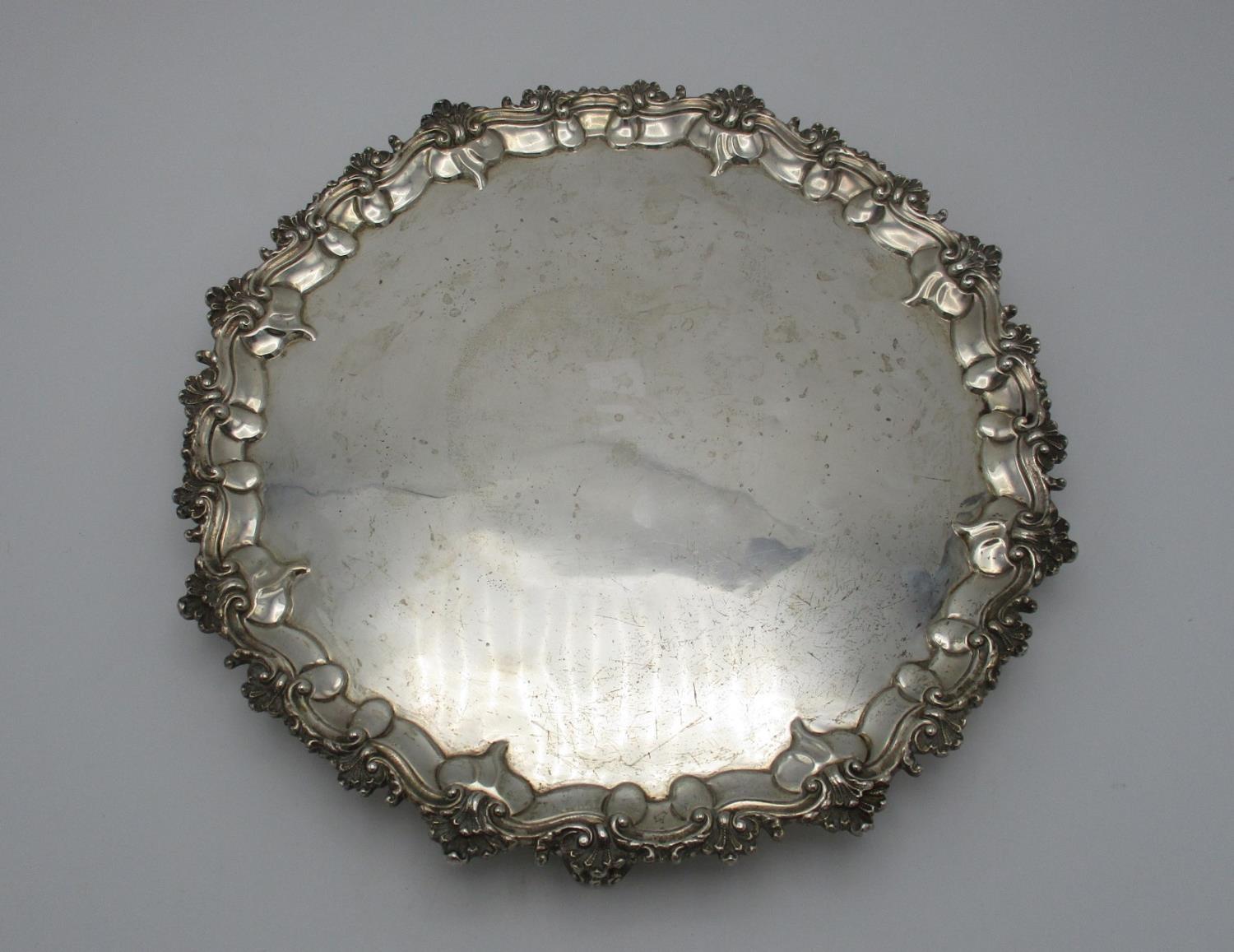 A Victorian silver salver by the Goldsmiths Alliance Ltd, London 1867, of circular shape with - Image 2 of 4