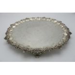 A Victorian silver salver by the Goldsmiths Alliance Ltd, London 1867, of circular shape with