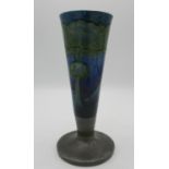 A Moorcroft for Liberty & Co 'Moonlit Blue' pattern vase, with a hammered pewter mounted base, 19 cm