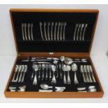 An Elizabeth II silver canteen of cutlery for eight people by A. Robinson, Sheffield 1981, with