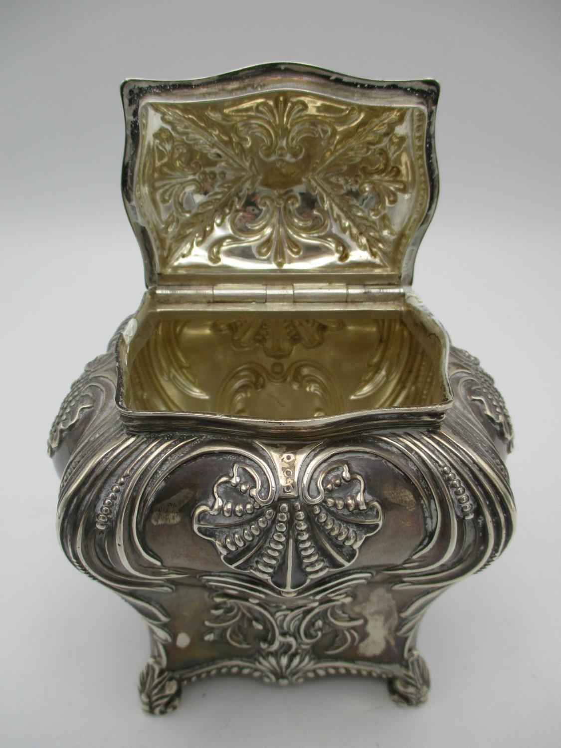 A Victorian silver tea caddy by Thomas Bradbury & Sons, London 1894, of bombe form with repousse - Image 6 of 7