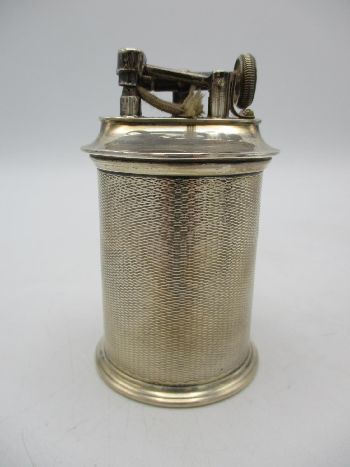 A George V silver table lighter by The Goldsmith and Silversmith Company Ltd, with cylindrical - Image 2 of 5