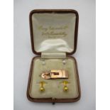 A cased pair of French 18ct gold studs with pearl, together with another pair of 18ct gold studs and