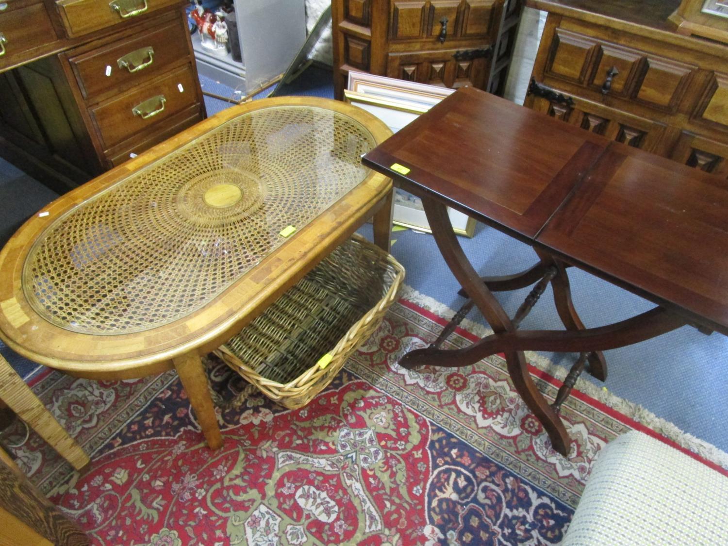 A modern inlaid wooden coffee table with inset glass and caned top, on square, tapering legs, a