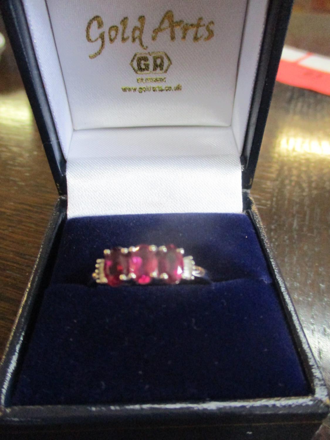 An 18ct white gold rubellite and diamond ring