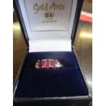 An 18ct white gold rubellite and diamond ring