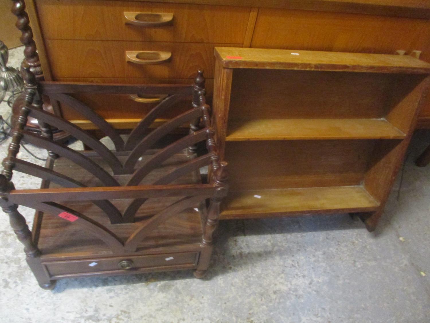 A reproduction rosewood finished Canterbury together with a small bookcase