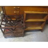 A reproduction rosewood finished Canterbury together with a small bookcase