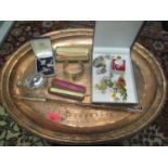 Collectables to include two cigarette holders, a silver condiment, badges and other items