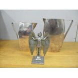 Two silver plated Art Deco style jugs, together with a silver plated model of a winged figure