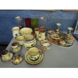 A mixed lot to include a pair of silver candlesticks, Torquay ware, a walnut cased clock, Aynsley