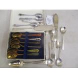 A small selection of cutlery, some silver to include a pair of sugar tongs