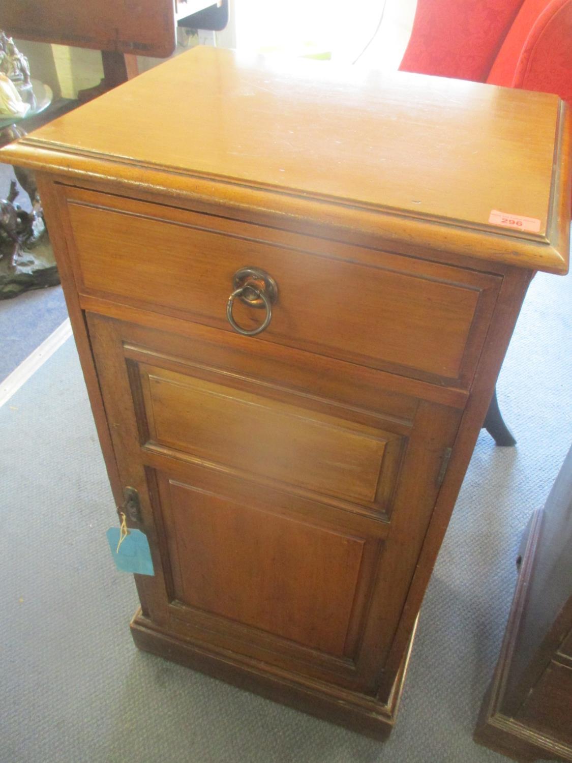 A Victorian walnut cabinet with a door and drawers, on a plinth, 100"h x 50"w