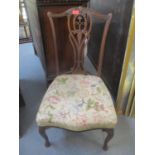 An early 20th century mahogany splat back nursing chair with a tapestry seat