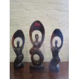 A group of three Nigerian wooden tribal art figures