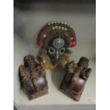 Two Indian carved wooden wall brackets fashioned as horses and an African tribal mask