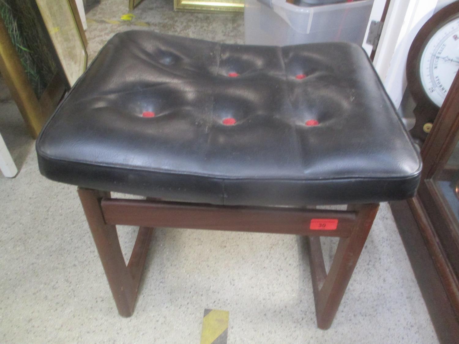 A mid 20th century Retro teak E Gomme G Plan leather topped stool