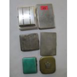 A group of cigarette cases to include a silver case, an early 20th century green guilloche enamelled