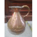 A large Victorian copper jug 44cm high