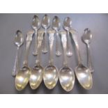 A set of five silver teaspoons, together with a set of six silver coffee spoons