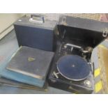 A Vintage cased record player, together with albums of mixed records