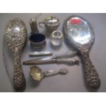 A mixed lot of silver to include Victorian dressing table items, silver handled glove stretchers,