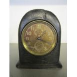 A Birch & Gaydon Ltd WWI period travel alarm clock, brass cased in a leather clad, wooden case, made