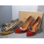 A pair of boxed Kurt Geiger red stiletto's, size 38 together with a pair of Burberry trainers size