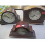 Three early 20th century mantle clocks to include an Edwardian mahogany inlaid clock having