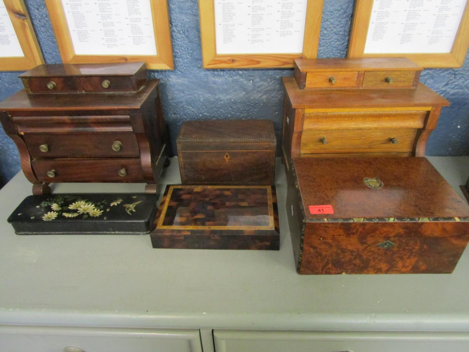 A selection of wooden boxed to include a Victorian papermache glove box, two miniature chests in the