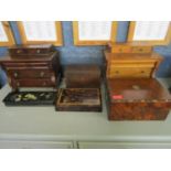 A selection of wooden boxed to include a Victorian papermache glove box, two miniature chests in the