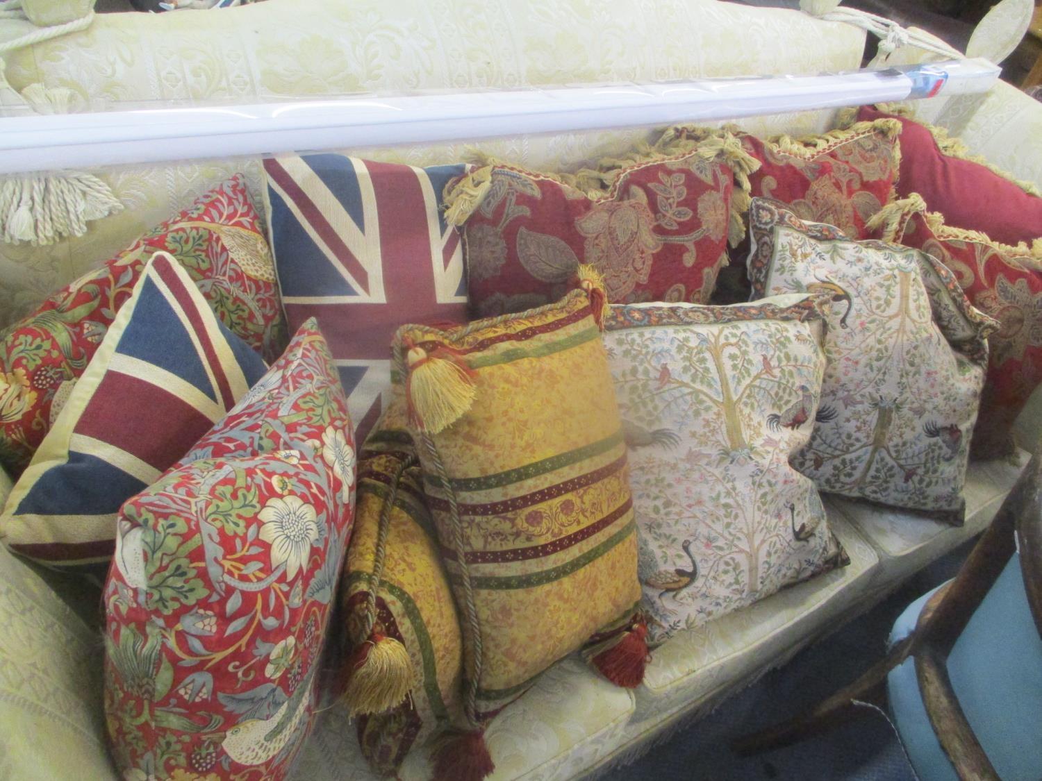 A selection of scatter cushions and a blind