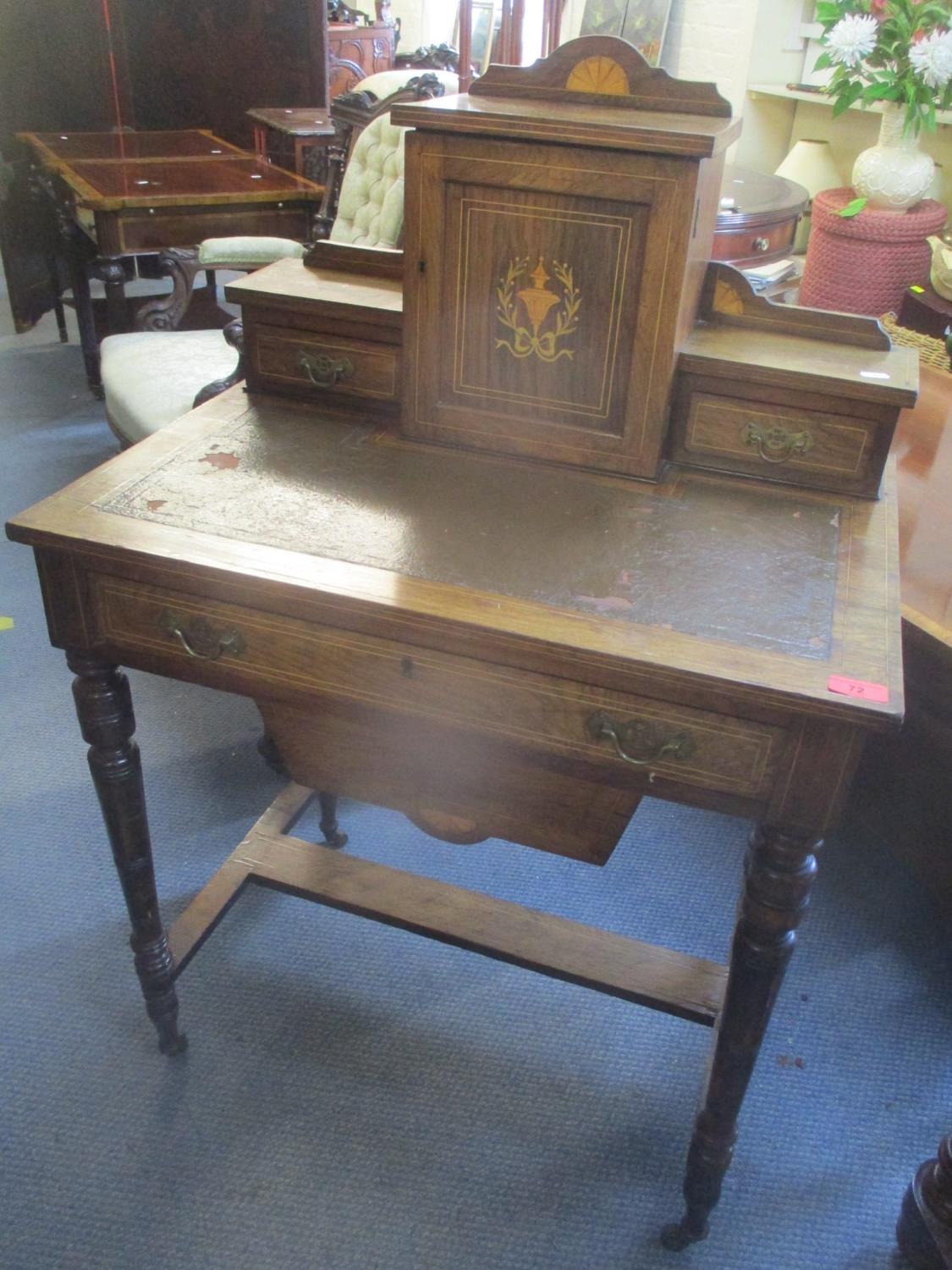An Edwardian walnut ladies writing table having string inlaid and single drawer above a sliding wool