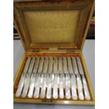 A Victorian silver plated and mother of pearl twelve piece setting fruit knives and forks with