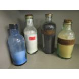 Four apothecary/chemist bottles and contents, two with labels