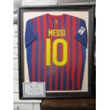 A Lionel Messi signed Barcelona shirt, framed and glazed