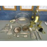 Silver plate and brassware to include a cake basket, fish servers, flatware, a sauce boat and