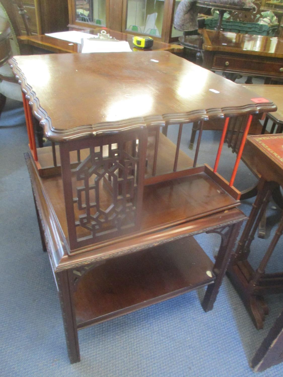 An early 20th century mahogany table with later adjustments having an Oriental style swivel top 76