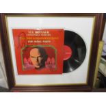 A 'The King and I' signed album by Yul Brynner, framed and glazed
