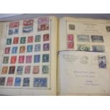 A vintage Stanley Gibbons stamp album and contents to include loose stamps and franked envelopes