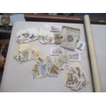 Cigarette cards and printed ephemera to include a Victorian wall hanging calendar