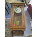 An early 20th century Arts & Crafts oak 8-day wall clock 82 cm h x 37 cm w